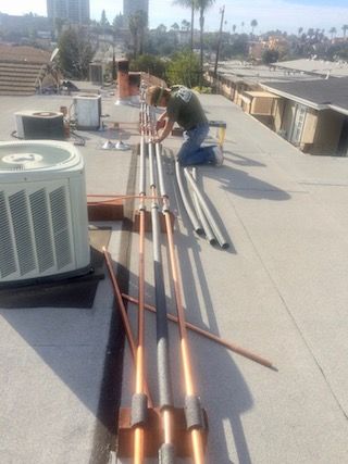 Condo building rooftop repipe